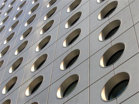 Circular windows of an office building in Hong Kong Stock Photo - Budget Royalty-Free & Subscription, Code: 400-03963484
