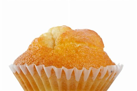 simsearch:689-03130285,k - A tasty muffin detail isolated on white background. Shallow DOF Foto de stock - Royalty-Free Super Valor e Assinatura, Número: 400-03963574