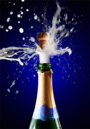 popping champagne cork - Close up of champagne cork popping Stock Photo - Budget Royalty-Free & Subscription, Code: 400-03963687