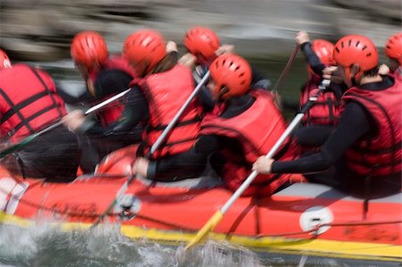 simsearch:841-07202440,k - A red rafting team in action on whitewater. With tripod and long exposure time - motion blurred. Photographie de stock - Aubaine LD & Abonnement, Code: 400-03963883