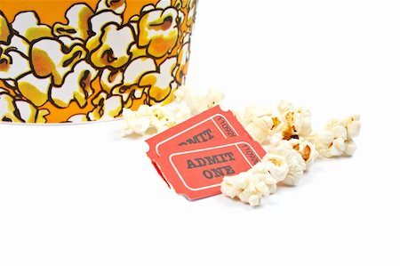 simsearch:600-05803386,k - Popcorn bucket with two tickets on white background Photographie de stock - Aubaine LD & Abonnement, Code: 400-03963968