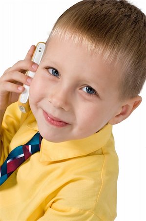 portrait of little boy play with mobile phone Stock Photo - Budget Royalty-Free & Subscription, Code: 400-03974422