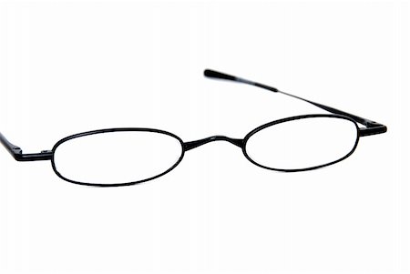 strikerx98 (artist) - A pair of black framed reading glasses isolated on white. Stock Photo - Budget Royalty-Free & Subscription, Code: 400-03974512