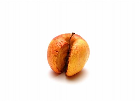 decaying fruit photography - An apple missing a sm\lice that is beginning to spoil. Stock Photo - Budget Royalty-Free & Subscription, Code: 400-03974529