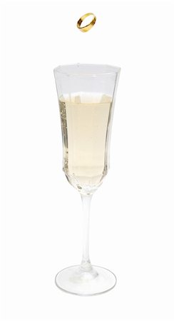 strikerx98 (artist) - A glass of champagne with a wedding band being dropped into it. Stock Photo - Budget Royalty-Free & Subscription, Code: 400-03974538