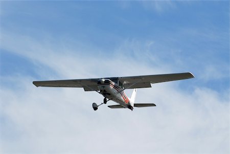 simsearch:400-05272036,k - Light plane landing at Palo Alto Airport, California Foto de stock - Super Valor sin royalties y Suscripción, Código: 400-03974868