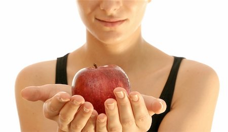 simsearch:400-05069103,k - Beautiful young woman eating red apple. Isolated over white Foto de stock - Super Valor sin royalties y Suscripción, Código: 400-03975239