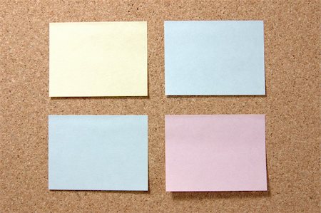 simsearch:400-04497952,k - Four colorful post-it notes on corkboard Stock Photo - Budget Royalty-Free & Subscription, Code: 400-03975275