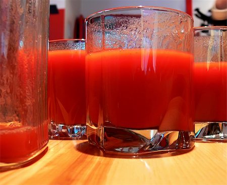 Few glasses of tomato juice in cafe Stock Photo - Budget Royalty-Free & Subscription, Code: 400-03975385