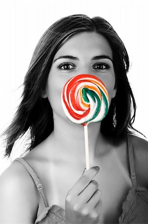 Lollypop Girl - Beautiful woman with a candy in the hands Stock Photo - Budget Royalty-Free & Subscription, Code: 400-03975669