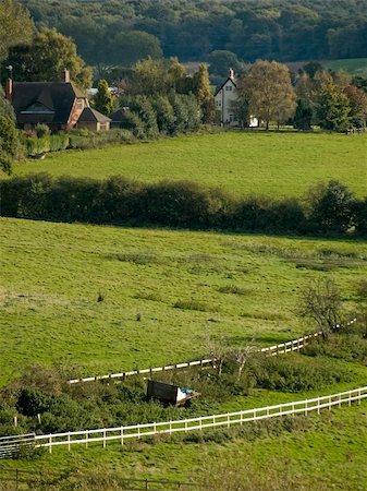 simsearch:400-04015482,k - A view over fields and farmland. Photographie de stock - Aubaine LD & Abonnement, Code: 400-03976028