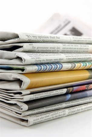 simsearch:400-04682528,k - Pile of newspaper in isolated background Stock Photo - Budget Royalty-Free & Subscription, Code: 400-03977202