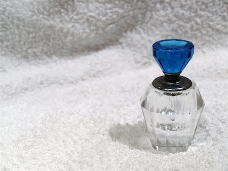 Perfume bottle - image ideal for perfume, make-up or cosmetic concepts Stock Photo - Budget Royalty-Free & Subscription, Code: 400-03977510