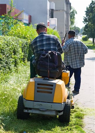 street cleaning - two men are cutting grass Photographie de stock - Aubaine LD & Abonnement, Code: 400-03977525