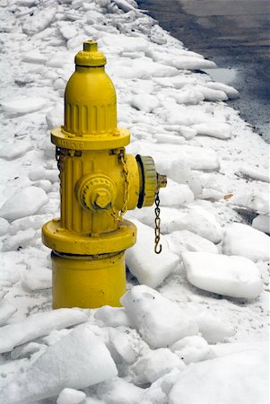 Hydrant stands out on icy sidewalk Stock Photo - Budget Royalty-Free & Subscription, Code: 400-03977647