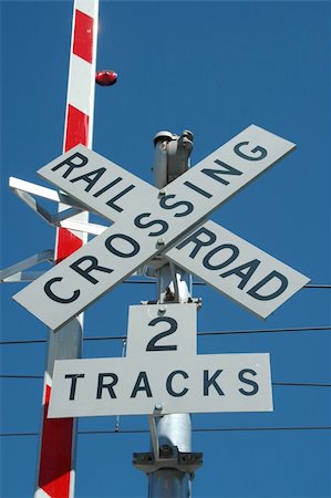 Railroad Crossing signs Photographie de stock - Aubaine LD & Abonnement, Code: 400-03977930