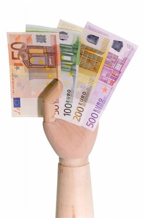 simsearch:400-06102745,k - Wooden hand holding Euro bills on white background Photographie de stock - Aubaine LD & Abonnement, Code: 400-03977996
