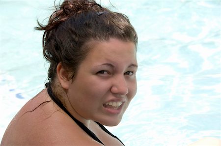 ponytail sunbathing - Teenage girl in bikini sunbathing in the summer Stock Photo - Budget Royalty-Free & Subscription, Code: 400-03978043