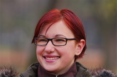 simsearch:400-04323304,k - Image of a redheaded girl smiling.Shot with Canon 70-200mm f/2.8L IS USM Stock Photo - Budget Royalty-Free & Subscription, Code: 400-03978086