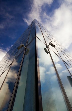 Corner of glass faced office building reflecting sky Stock Photo - Budget Royalty-Free & Subscription, Code: 400-03978103
