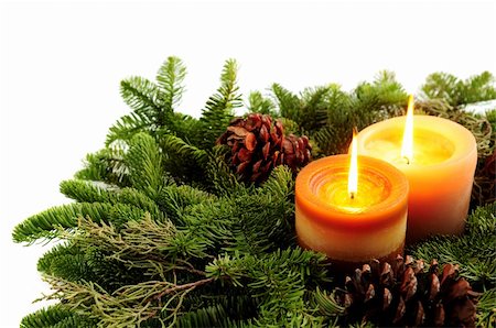 pine wreath on white - Christmas arrangement of burning candles and green spruce branches on white background Stock Photo - Budget Royalty-Free & Subscription, Code: 400-03978180