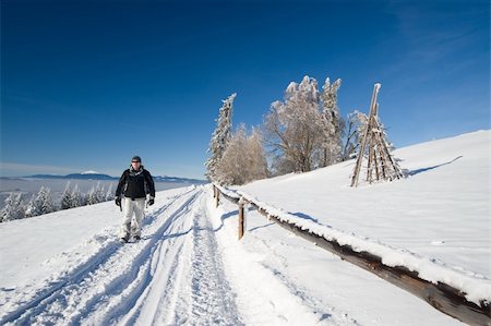 simsearch:400-06201867,k - Winter trekking in rural scenery during beautiful day Stock Photo - Budget Royalty-Free & Subscription, Code: 400-03978220