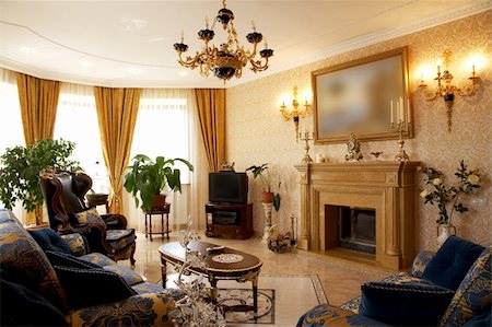 elegant tv room - Fireplace, armchairs and a sofa in a beautiful cottage Foto de stock - Super Valor sin royalties y Suscripción, Código: 400-03979069
