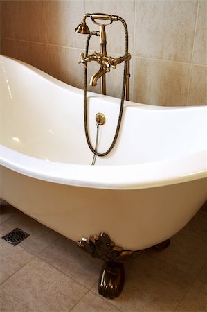 simsearch:400-04026996,k - Magnificent bath with a beautiful bronze shower Stock Photo - Budget Royalty-Free & Subscription, Code: 400-03979161