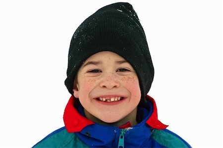 Boy With Big Smile Playing in the Snow Stock Photo - Budget Royalty-Free & Subscription, Code: 400-03979415