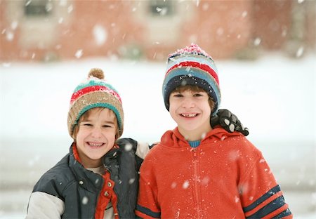 simsearch:600-03404008,k - Boys Outside Playing in the Middle of a Snow Storm Stock Photo - Budget Royalty-Free & Subscription, Code: 400-03979417