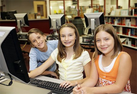 simsearch:400-04484714,k - A group of students learning computers in school. Stock Photo - Budget Royalty-Free & Subscription, Code: 400-03970426