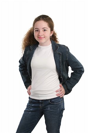 smiling young latina models - A casual teen girl modeling denim and a white t-shirt. Photographie de stock - Aubaine LD & Abonnement, Code: 400-03970423