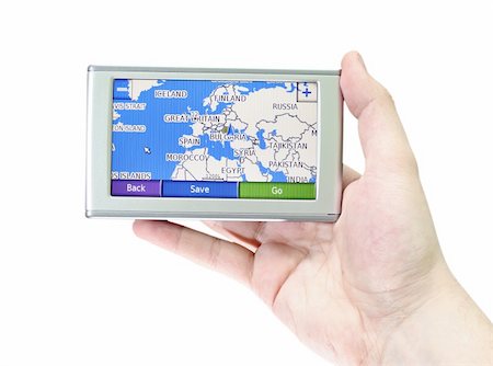 simsearch:400-08957399,k - GPS VEHICLE NAVIGATION SYSTEM IN A MAN HAND ISOLATED ON WHITE Photographie de stock - Aubaine LD & Abonnement, Code: 400-03970633