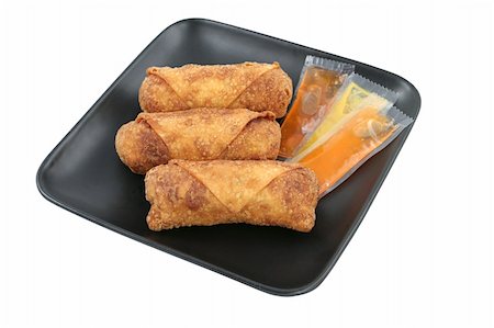 simsearch:400-03970927,k - Crispy fried Chinese egg rolls with duck sauce and mustard.  Isolated with clipping path. Foto de stock - Royalty-Free Super Valor e Assinatura, Número: 400-03970929