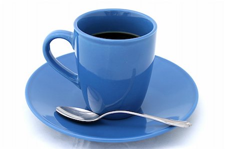 simsearch:400-03970916,k - A blue cup of coffee and a spoon isolated on white. Foto de stock - Royalty-Free Super Valor e Assinatura, Número: 400-03970920