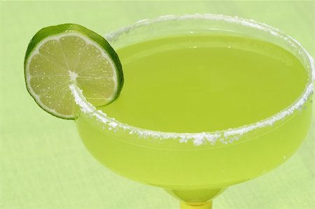 salt rim - A luscious green margarita with lime against a green background. Stock Photo - Budget Royalty-Free & Subscription, Code: 400-03970940