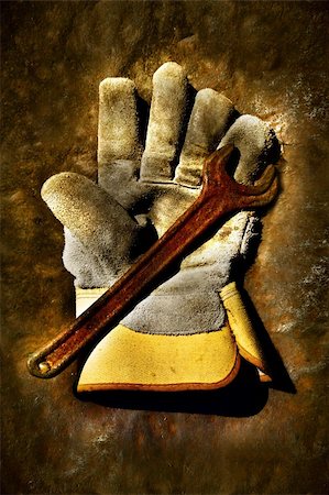 simsearch:872-08140675,k - Used work glove with old rusty wrench Stock Photo - Budget Royalty-Free & Subscription, Code: 400-03971414