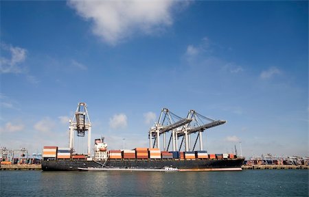 packages on loading dock - Cranes and carriers in the Port of Rotterdam Stock Photo - Budget Royalty-Free & Subscription, Code: 400-03971635