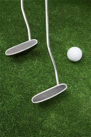 simsearch:400-03945601,k - Two clubs and ball for a golf on a grass Stock Photo - Budget Royalty-Free & Subscription, Code: 400-03971839