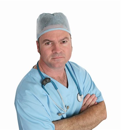 simsearch:400-04217553,k - A handsome doctor in scrubs looking concerned.  Isolated. Foto de stock - Royalty-Free Super Valor e Assinatura, Número: 400-03972279