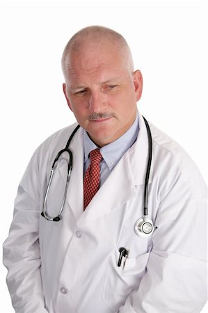 simsearch:400-04552598,k - A handsome, mature doctor worried about a patient's health. Foto de stock - Super Valor sin royalties y Suscripción, Código: 400-03972452