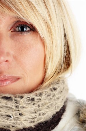 Beatiful woman wearing a warm winter coat and scarf Stock Photo - Budget Royalty-Free & Subscription, Code: 400-03972499