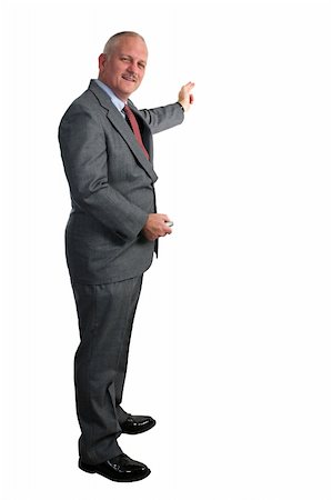 simsearch:400-07450015,k - a full view of a weatherman (or businessman) pointing at a chart or map.  Room for text or graphics. Foto de stock - Super Valor sin royalties y Suscripción, Código: 400-03972491