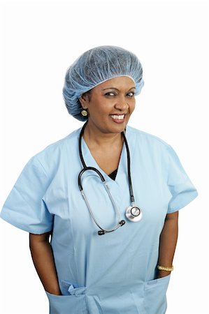 A friendly surgical nurse in scrubs and a hairnet. Stock Photo - Budget Royalty-Free & Subscription, Code: 400-03972907