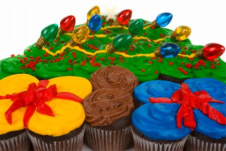 Christmas cupcakes in the shape of Christmas tree and gifts Stock Photo - Budget Royalty-Free & Subscription, Code: 400-03973564