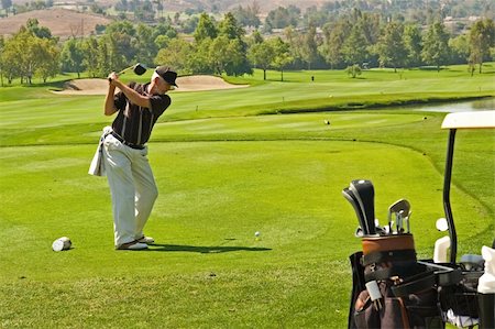 A golf course and senior golfers in action Photographie de stock - Aubaine LD & Abonnement, Code: 400-03973759