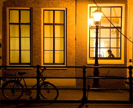 Working at night in an Amsterdam canal house Stock Photo - Budget Royalty-Free & Subscription, Code: 400-03973792