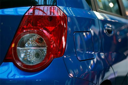 paraurti - Detail of Latest model Car Rear Lights Fotografie stock - Microstock e Abbonamento, Codice: 400-03973877