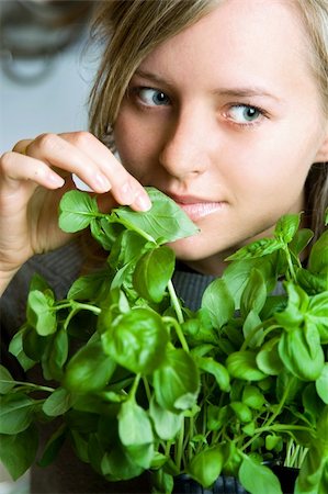 pretty woman smell fresh basil Stock Photo - Budget Royalty-Free & Subscription, Code: 400-03984051