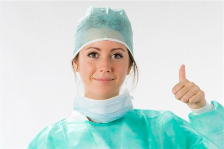 simsearch:400-05060422,k - young nurse just after operation in surgery Stock Photo - Budget Royalty-Free & Subscription, Code: 400-03984220